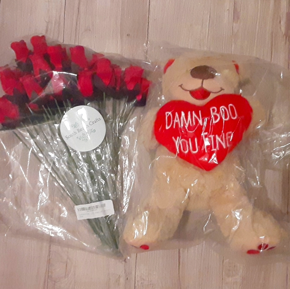 New teddy bear and flower